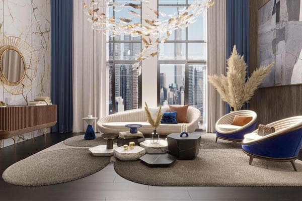 هر آنچه درباره تأثیر رنگ در دکوراسیون منزل باید بدانید 1 A living room with orange walls and a couch Description automatically generated